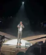 Burna Boy Stops Concert, Orders Fan to Leave Over Sleeping Girlfriend