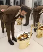 Gold Toilet 'America' Sells for $12.1M at Sotheby's Auction