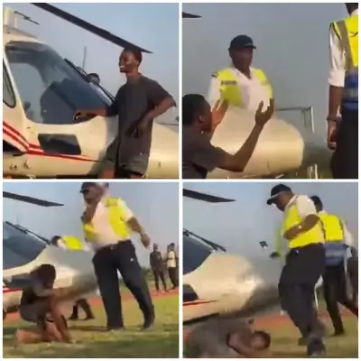 Airport Officer Assaults Fan Posing by Asake's Helicopter in OAU
