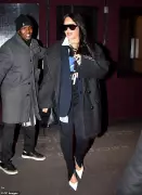 Rihanna's Awkward Hotel Exit: Bodyguard Lets Door Hit Singer in New York