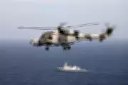 Royal Navy Wildcat Helicopter Escorts Russian Cargo Ship from Sensitive UK Waters