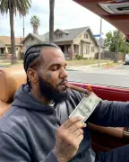 The Game Burns $100 Bill: 'Never in Love With Money'
