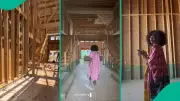 Nigerian Lady's Wood-Framed Dream House Construction Sparks Online Debate
