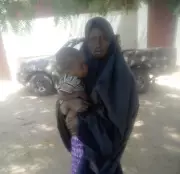 Wife of Neutralized Boko Haram Commander Surrenders with Child in Borno