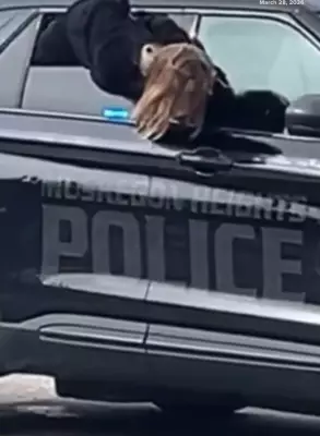 Handcuffed Woman Escapes Police Custody by Wriggling Out of Patrol Car Window