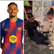 Barcelona's Raphinha Returns Home with MVP Award, Surprises Daughter