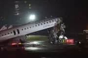 Two Killed in Runway Collision Between Plane and Fire Engine at New York's LaGuardia Airport