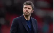 Michael Carrick warns Man United against over celebrating Champions League qualification