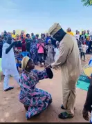 Nigerian Woman Kneels During Engagement Proposal, Sparks Online Reactions