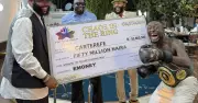 Carter Efe Receives ₦50 Million Cheque from E-Money After Beating Portable