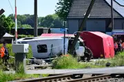 Four dead, including two children, as train hits school bus in Belgium