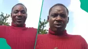 Nigeria Police Officer Apologizes After Threatening to Kill Civilians Filming Him