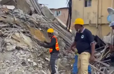 Rescue Team Reassures Trapped Woman in Rivers Building Collapse