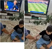 Father helps visually impaired son 'watch' Portugal match with tactile football board