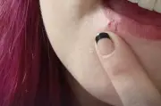 Oklahoma Arby's manager charged with poisoning after customer contracts herpes from spit