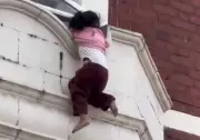 Three-Year-Old Girl Dangling from Window Ledge Rescued by Heroic Stranger and Police
