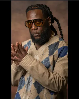Heartwarming Moment: Portugal Fans Sing Happy Birthday to Burna Boy as Mum Surprises Him with Cake Onstage