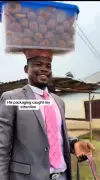 TikToker Rewards Well-Dressed Roadside Baker with ₦5,000 in Viral Encounter