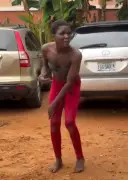 Woman Forced to Dance as Punishment for Sneaking into Compound in Awka