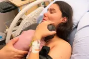Woman gives birth in her sleep, baby found under blankets minutes later