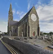 Woman stabbed at altar during mass in Irish church, man arrested
