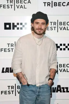 Brooklyn Beckham Covers Up Family Tattoos Amid Feud with Parents