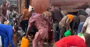 Lagos residents scoop diesel from fallen tanker in Apapa despite fire risk