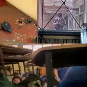 Thai teen kills 8 in school shooting after killing grandparents