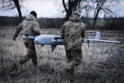 Ukraine Deploys Combat Robot via Drone in First Marsupial Attack