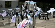 AI robots protest in Warsaw for human job safety and AI regulation