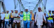 Umahi orders Tinubu's photos on First Niger Bridge, removes illegal adverts